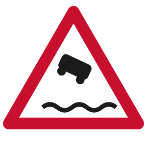 Quayside or river bank road sign